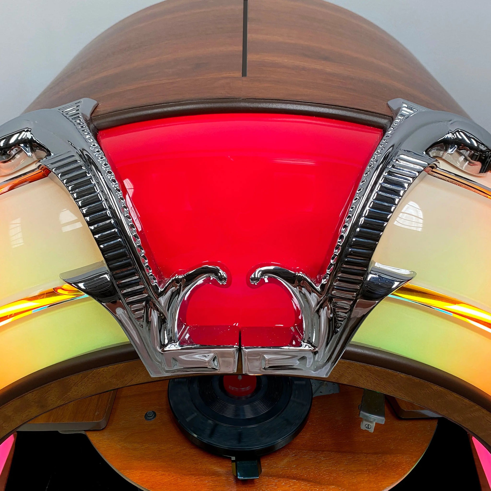 An overhead shot of the Rock-Ola Bubbler Vinyl Deluxe Jukebox